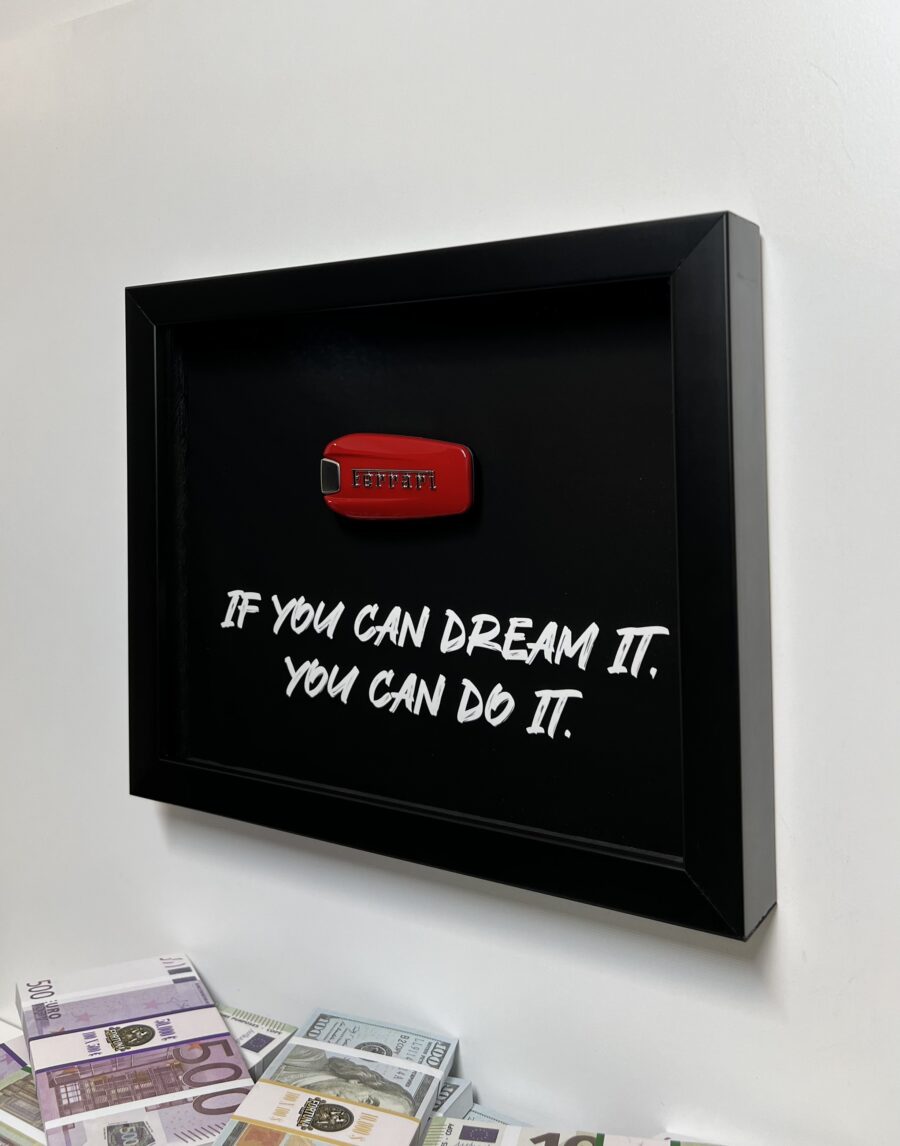 Fekete "If you can dream it, you can do it" motivációs fali dekoráció 3D-s Ferrari autókulccsal és játékpénz kötegekkel.